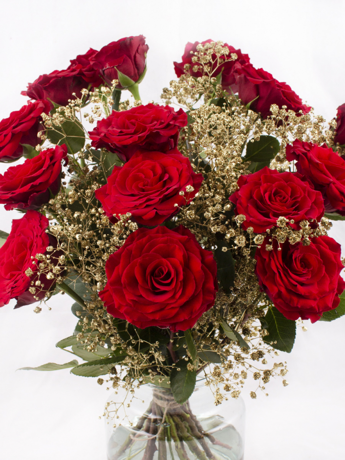 Red bouquet with gold coloured gypsophila